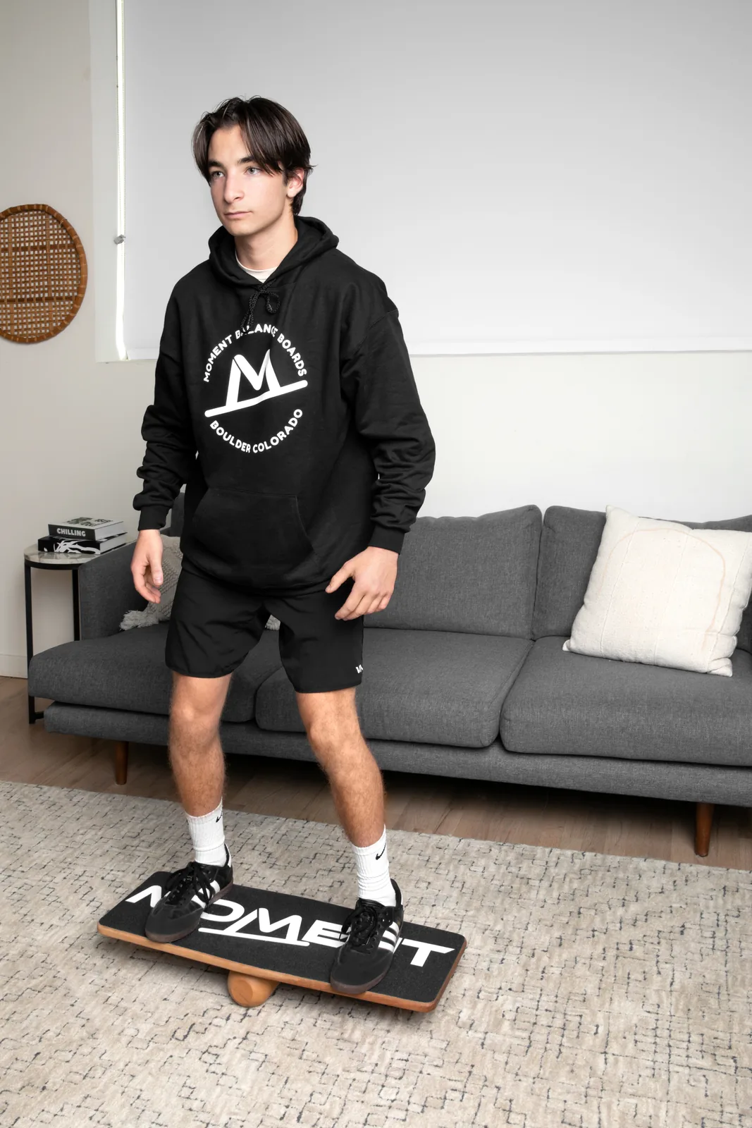 Athlete training on the Moment Balance Board at home